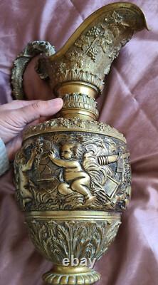 Aiguière Napoléon III bronze massif à décor de putti pampres & mascaron satyre