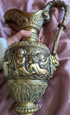 Aiguière Napoléon III bronze massif à décor de putti pampres & mascaron satyre