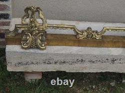 Barre de cheminée XIX EME en bronze. Long 90 cm. Long déployée 116 cm. Haut 21 cm