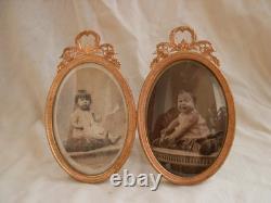 CADRE PHOTOS DOUBLE EN BRONZE ET LAITON DORE, EPOQUE FIN 19ème