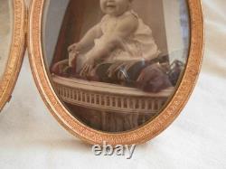 CADRE PHOTOS DOUBLE EN BRONZE ET LAITON DORE, EPOQUE FIN 19ème