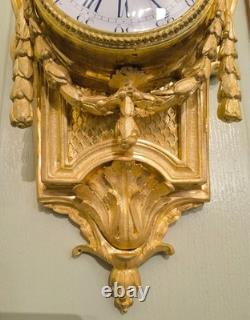 Cartel d'alcôve en bronzes dorés d'aprés un modéle d'Osmond Epoque Napoléon III