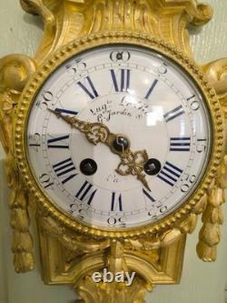 Cartel d'alcôve en bronzes dorés d'aprés un modéle d'Osmond Epoque Napoléon III