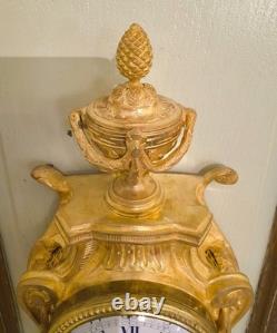 Cartel d'alcôve en bronzes dorés d'aprés un modéle d'Osmond Epoque Napoléon III