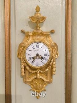 Cartel d'alcôve en bronzes dorés d'aprés un modéle d'Osmond Epoque Napoléon III