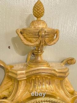 Cartel d'alcôve en bronzes dorés d'aprés un modéle d'Osmond Epoque Napoléon III