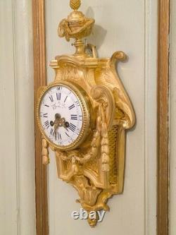 Cartel d'alcôve en bronzes dorés d'aprés un modéle d'Osmond Epoque Napoléon III