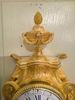 Cartel d'alcôve en bronzes dorés d'aprés un modéle d'Osmond Epoque Napoléon III