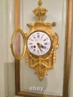 Cartel d'alcôve en bronzes dorés d'aprés un modéle d'Osmond Epoque Napoléon III