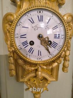 Cartel d'alcôve en bronzes dorés d'aprés un modéle d'Osmond Epoque Napoléon III