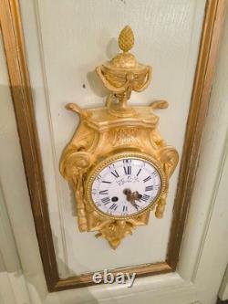 Cartel d'alcôve en bronzes dorés d'aprés un modéle d'Osmond Epoque Napoléon III