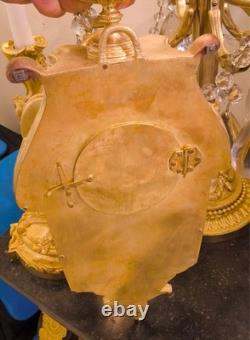 Cartel d'alcôve en bronzes dorés d'aprés un modéle d'Osmond Epoque Napoléon III