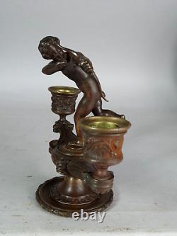 Chandelier bronze patiné surmonté d'un cupidon XIXe siècle