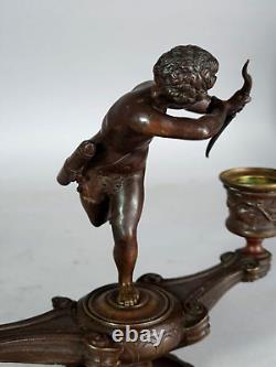 Chandelier bronze patiné surmonté d'un cupidon XIXe siècle