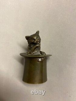 Clochette de table au chat et au chapeau en bronze