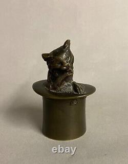 Clochette de table au chat et au chapeau en bronze