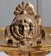 Coupe Circulaire En Bronze Dore A Decor De Mascarons Sur Un Socle En Marbre