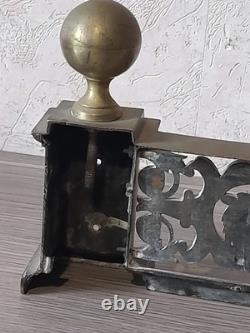 Devant de cheminée époque 19é en bronze a décor de mufles de lion