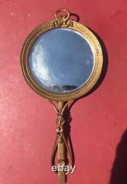 Elégant miroir de vanité face à main Empire en bronze doré Napoléon 3 déco