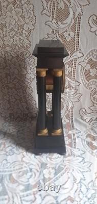 H C. Horloger Pendule à colonnes bois noirci bronze doré époques Napoléon III