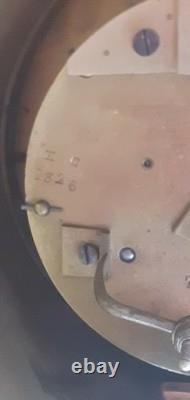 H C. Horloger Pendule à colonnes bois noirci bronze doré époques Napoléon III