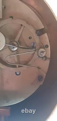 H C. Horloger Pendule à colonnes bois noirci bronze doré époques Napoléon III