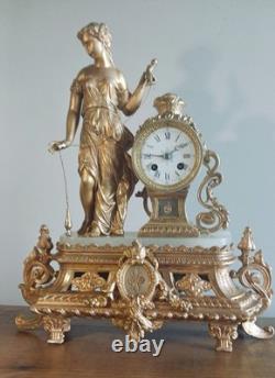 Horloge ancienne en bronze, albatre et régule