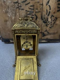 Horloge pendule bronze doré ciselé style rocaille 4 Jewels 8 Day À réviser