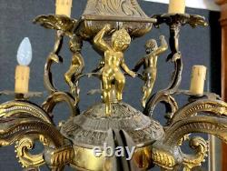 Important lustre st. Napoléon III en bronze doré et patiné a décors de putti
