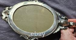 Miroir Face à main Napoléon III en bronze argenté Putto ou ange ailé & mascaron