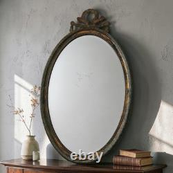 Miroir ancien en bois doré Napoléon III Louis XVI laurier rubans patiné 110 cm