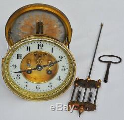 Mouvement de pendule Brocot avec balancier mercure et clé XIXème siècle