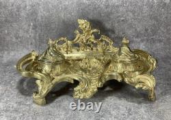 NÉCESSAIRE DE BUREAU. ENCRIER DOUBLE NAPOLÉON III. Bronze doré. Rocaille