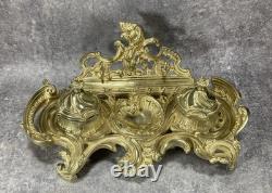 NÉCESSAIRE DE BUREAU. ENCRIER DOUBLE NAPOLÉON III. Bronze doré. Rocaille