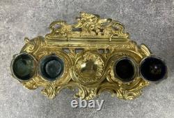 NÉCESSAIRE DE BUREAU. ENCRIER DOUBLE NAPOLÉON III. Bronze doré. Rocaille