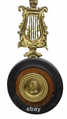 Ornement BRONZE XIX ème Médaillon de NAPOLÉON suspendu à une LYRE