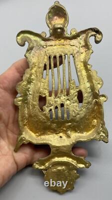 Ornement BRONZE XIX ème Médaillon de NAPOLÉON suspendu à une LYRE