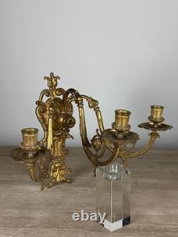 Paire d'appliques Napoléon III, en bronze doré à des décor de perles