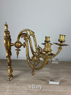 Paire d'appliques Napoléon III, en bronze doré à des décor de perles