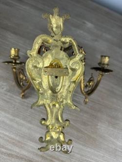 Paire d'appliques Napoléon III, en bronze doré à des décor de perles