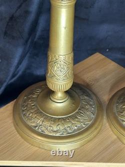 Paire de bougeoirs Napoléon III en bronze / laiton doré Décor à l'antique
