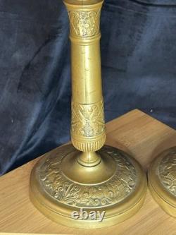 Paire de bougeoirs Napoléon III en bronze / laiton doré Décor à l'antique