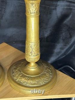 Paire de bougeoirs Napoléon III en bronze / laiton doré Décor à l'antique