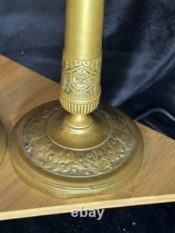 Paire de bougeoirs Napoléon III en bronze / laiton doré Décor à l'antique