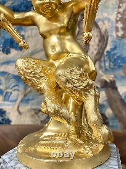 Paire de candelabres Aux Puttis, Bronze Doré. Epoque Napoléon III