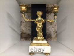 Paire de chandeliers Faunes Bacchus