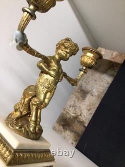 Paire de chandeliers Faunes Bacchus