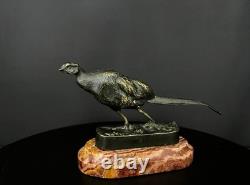 Paire de faisans en bronze patiné sur marbre rouge