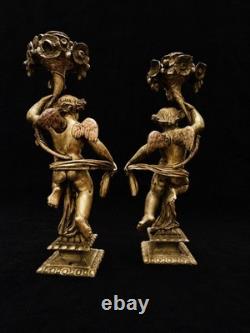 Paire de grands bougeoirs aux putti en bronze doré XIXe 33 cm 4 kg