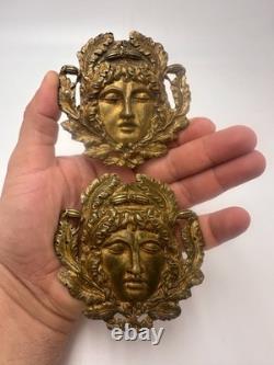 Paire de mascarons décoratifs en bronze XIXe éléments de meubles